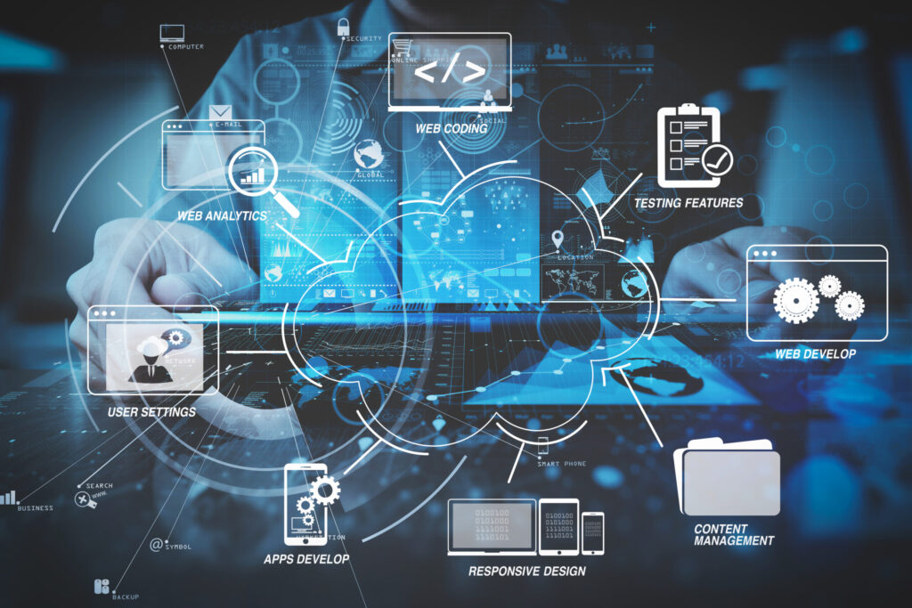 businessman hand working with modern computer in modern office with virtual icon diagram Custom software built on Microsoft