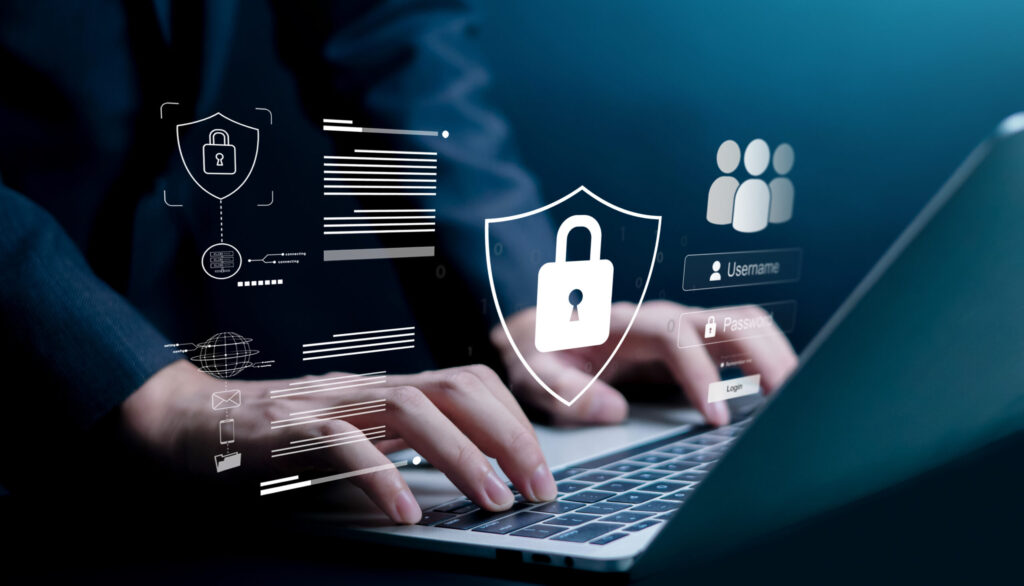 Business professional typing on laptop with cybersecurity lock icons and login interface. Concept of data protection, online privacy, secure access, password authentication and network security. A security-first, engineer-led approach